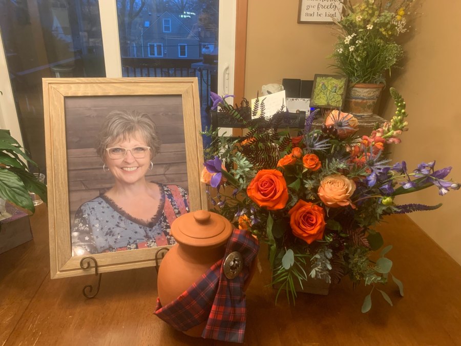 Angelique's framed photograph with flowers